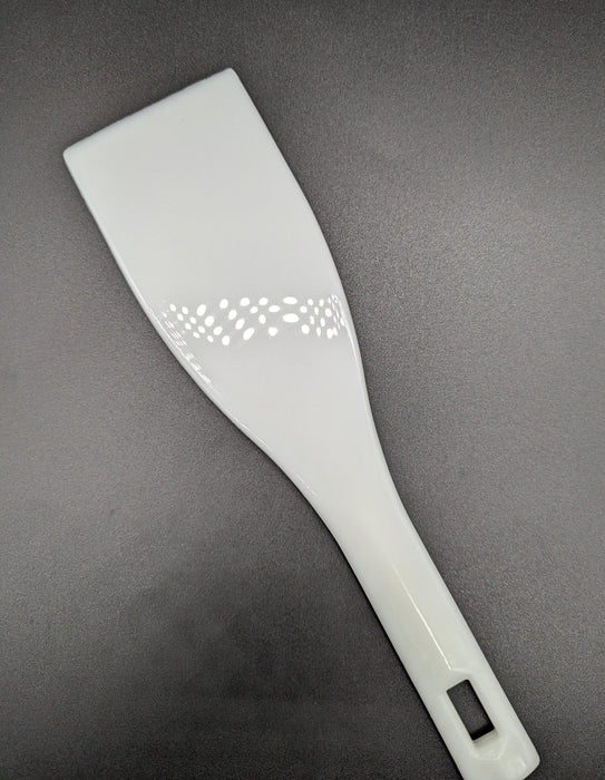 Espatula blanca plástica